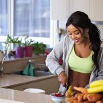 Healthy woman cooking andfollowing a pro metabolic diet