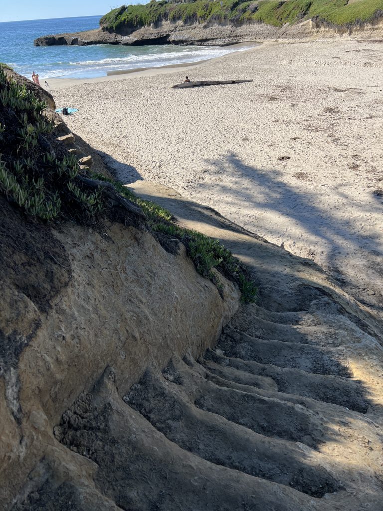 Capitola & Santa Cruz beaches stairs to the see with white sand
