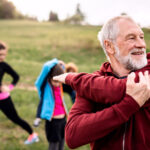 Group of people exercising outside