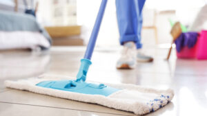 Person mopping the floor